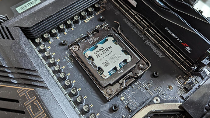 an amd ryzen 5 7600 processor sitting in a motherboard